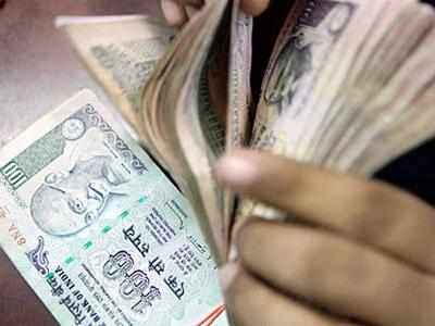 Rupee climbs to 2-week high against dollar, up 11 paise