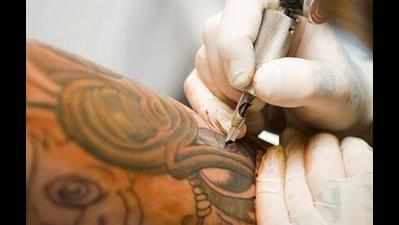 Dragon tattoo helps bust gang of burglars
