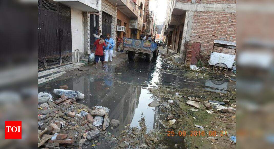 Choked drains in Palam Times of India