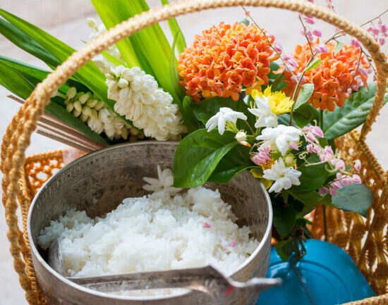 Attend the Buddhist ceremony of alms giving to monks