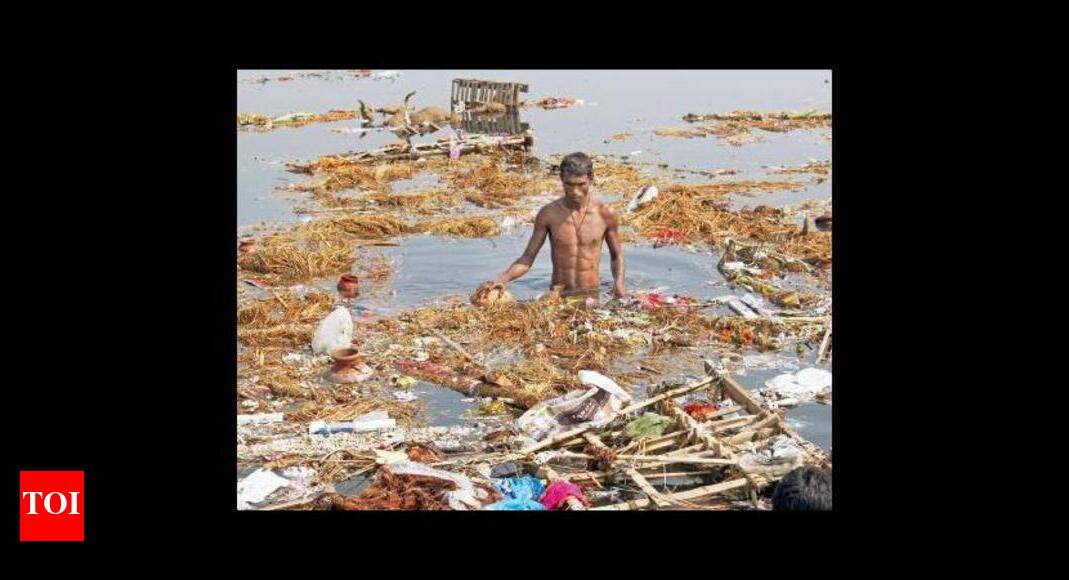 Not so ideal worship: Puja waste chokes river | Delhi News - Times of India