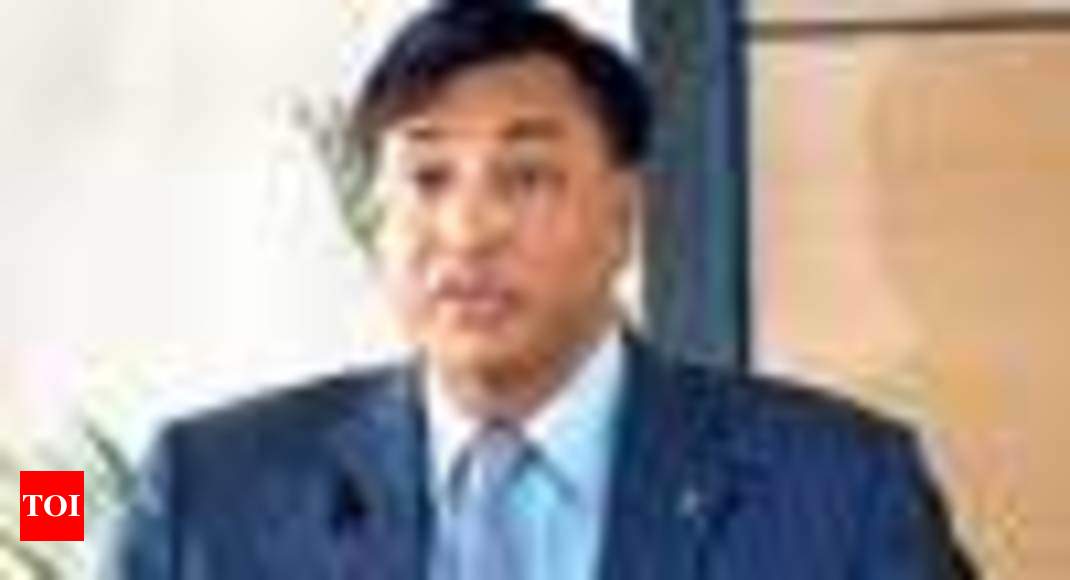 Lakshmi Mittal passes the steel baton to son Aditya - Times of India