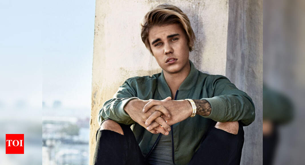 Justin Bieber buys roses for lucky fans | English Movie News - Times of ...