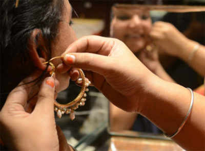 Jewellery shops crowded with people buying gold on Dhanteras