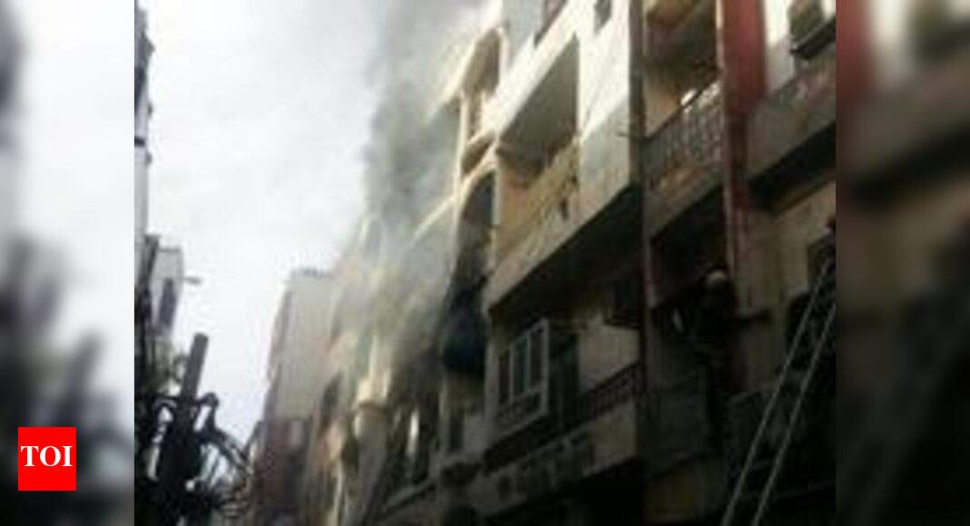 Delhi: Cops rescue 27 from burning building | Delhi News - Times of India