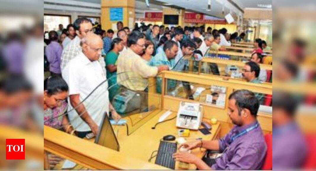 Cash ran out early at several branches in Ahmedabad Ahmedabad News Times of India