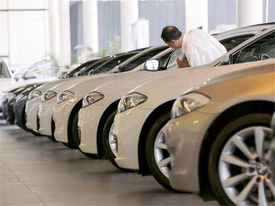 Cash-strapped buyers may walk past auto showrooms
