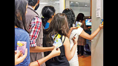 Long queues at ATMs? For a 20% cut, these students will withdraw the money for you!