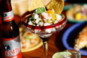 Enjoy cocktails in waterfront bars