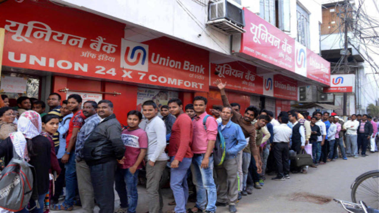 Cash for queues: people paid to stand in line amid India's bank