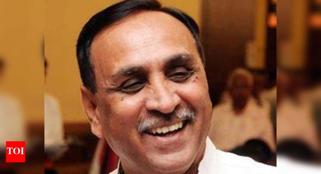 Vijay Rupani: Gujarat CM Vijay Rupani felicitates litterateurs and ...