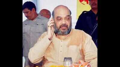 BJP president Amit Shah may aim chit fund darts at Naveen, feel BJP leaders