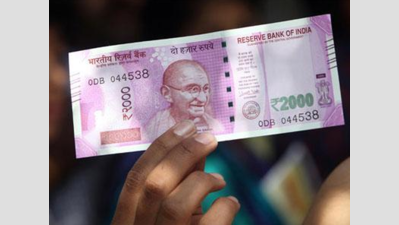 Want to break Rs 2,000 note? First spend half of it