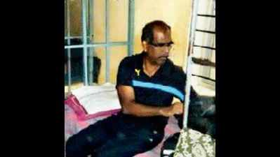 Officer lives in government hostel, sleeps, eats with students