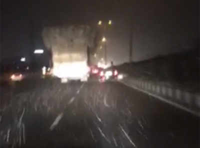 NH8-a truck is spreading husk all over