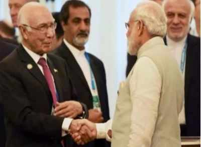 Pak media on Sartaj’s visit and Modi-Aziz handshake
