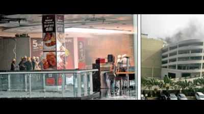 Morning fire triggers panic at South City Mall
