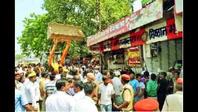 Forest dept removes illegal shops near Chandi Devi temple