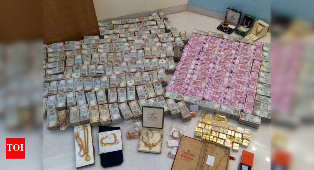 Rs 5.7 crore in new notes seized from 'secret bathroom chamber' of ...