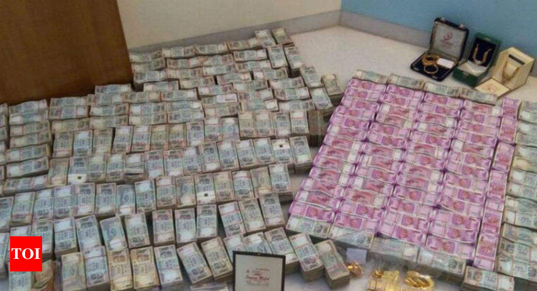 Rs 5.7 crore in new notes seized from 'secret bathroom chamber' of ...
