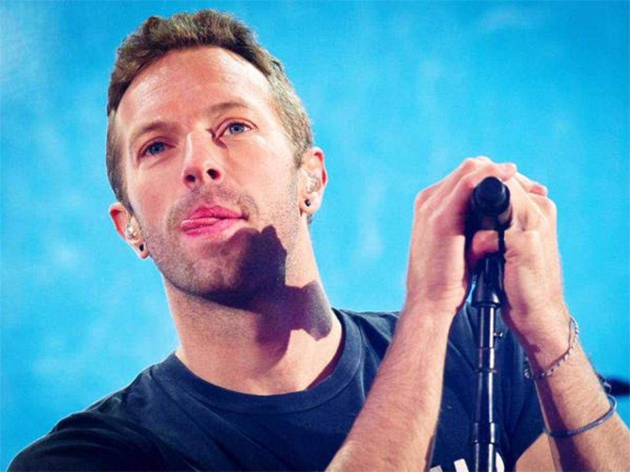 What Is Coldplay Singer Chris Martin's Net Worth Compared to His