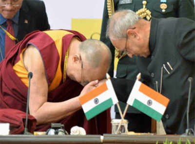 China protests Pranab's meeting with Dalai Lama, warns of disturbance to ties