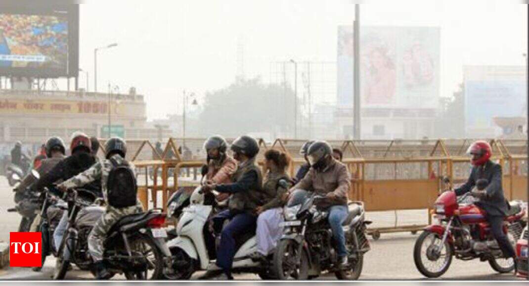 Barricade stays, 2-wheelers continue to find way around | Lucknow News ...