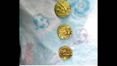 Cops seize eight more gold coins from villagers