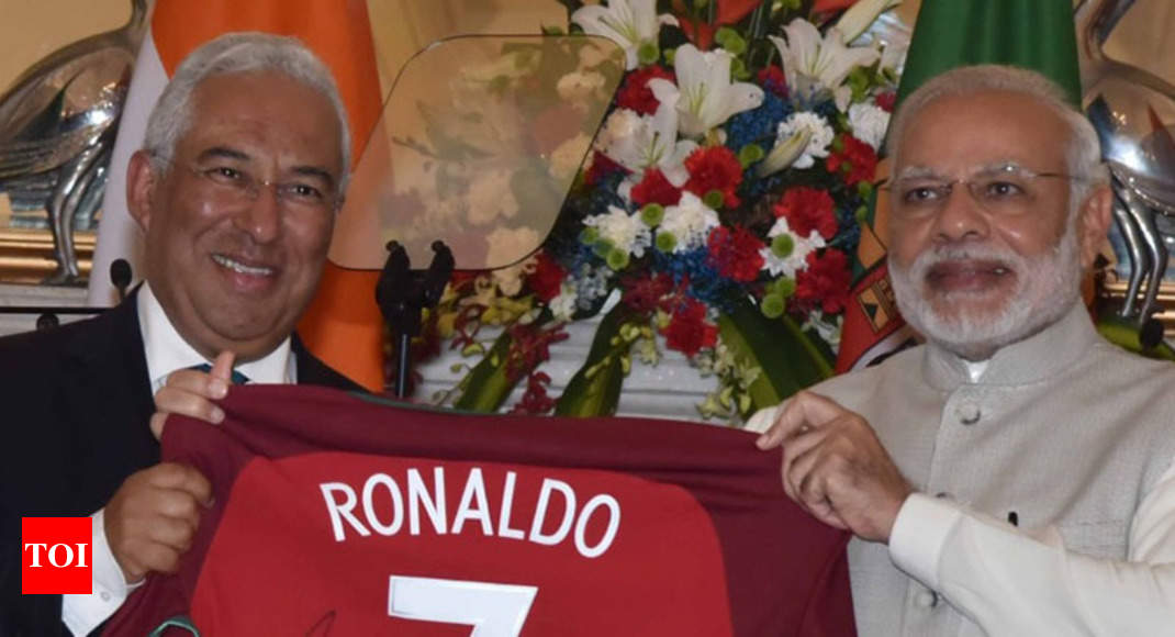 Narendra Modi: PM Modi receives jersey signed by Cristiano ...