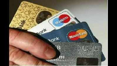2 share debit card details, duped of Rs 50,000