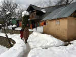 Rains, fresh snowfall throw life out of gear in J&K