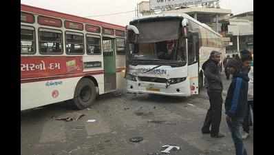 Private bus crashes into AMTS bus near Swastik Crossroads