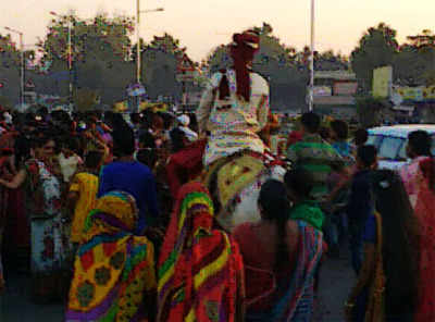 Marriage procession on road in peak hours