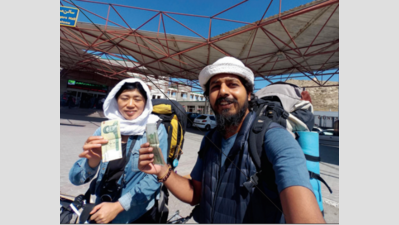 In 380 days, couple cuts through 17 countries, 38 borders on bicycles