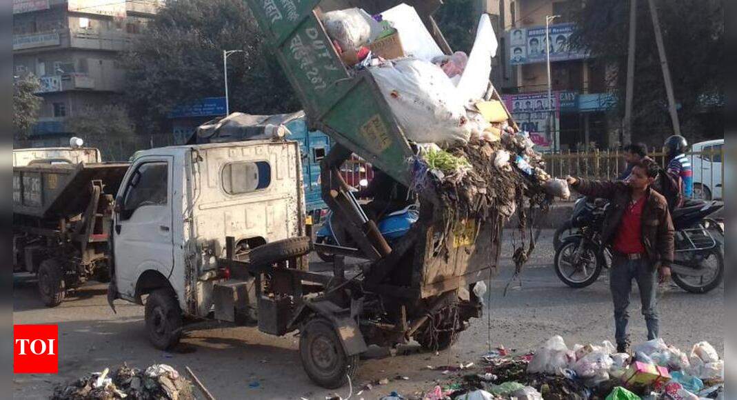 Roadside garbage bin - Times of India