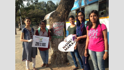Volunteers paint messages on Jayamahal trees marked for felling