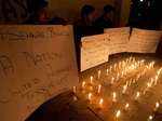 Photo story: IS suicide bombing at Pakistan shrine kills 75