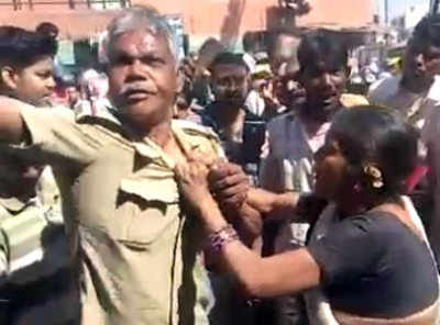 Ahmedabad: Woman beats up policeman in public