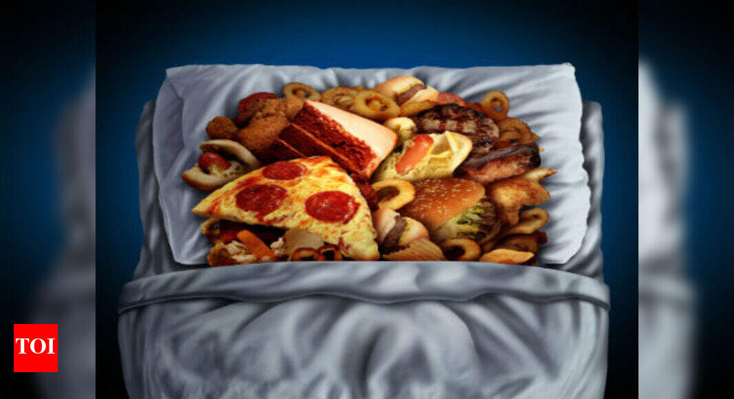 Sleeping hungry or munching late: What’s worse? - Times of India