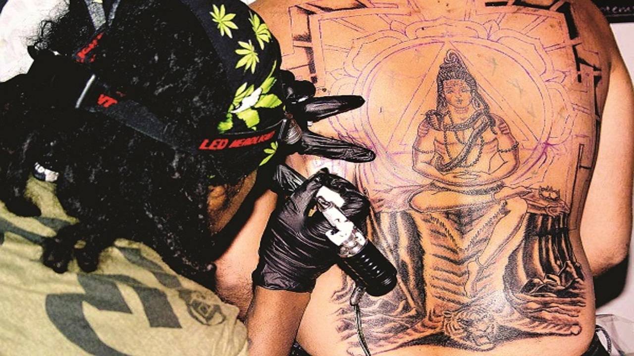 Shiva trishul tattoo on the back..... - FEAR Tattoo Studio | Facebook