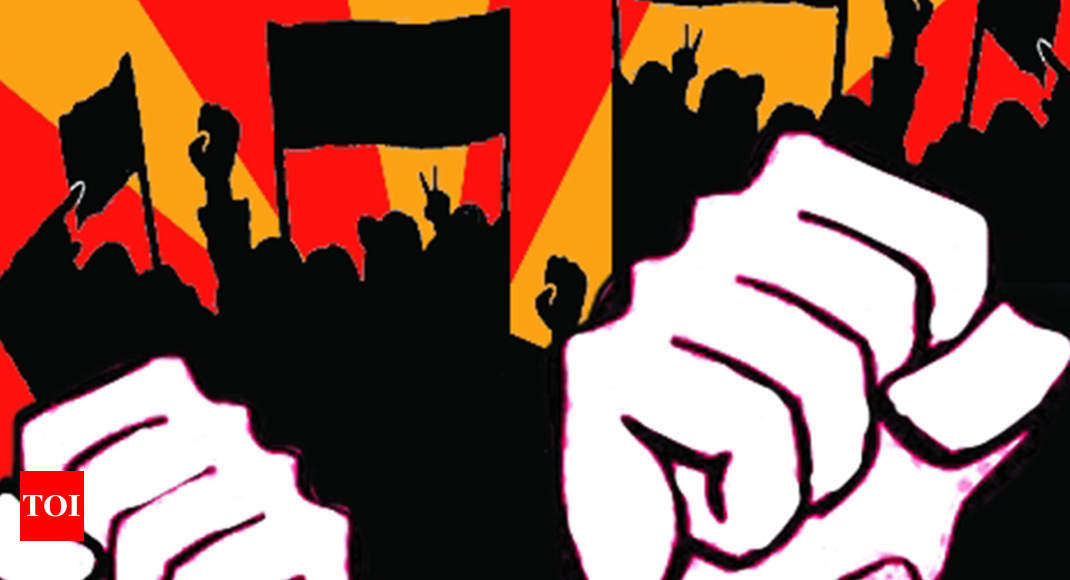 SFI stages silent protest on SPPU campus | Pune News - Times of India