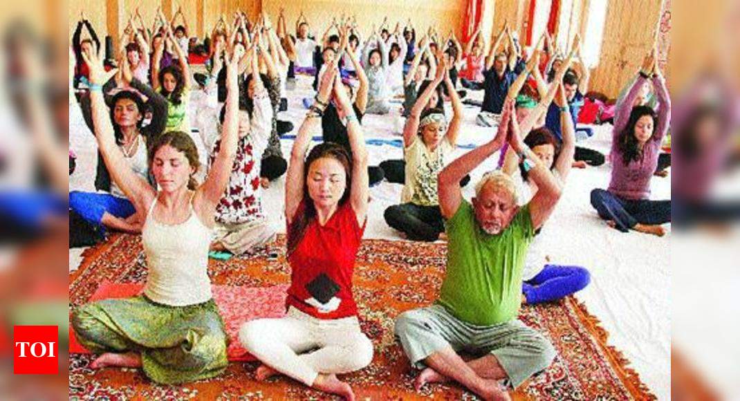 International Yoga Festival begins in Rishikesh - Times of India