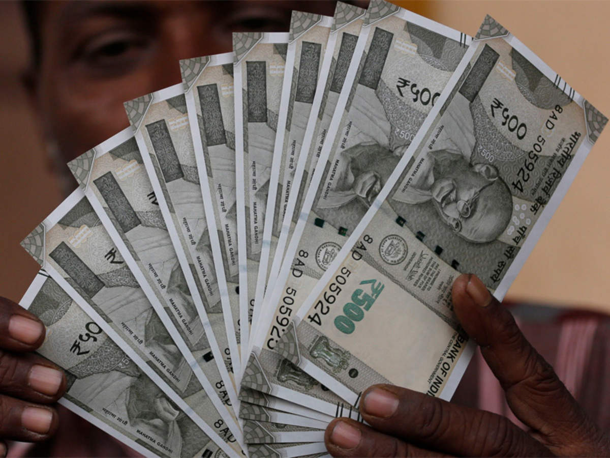 Rupee: Rupee rebounds 12 paise to 66.70 against US dollar - Times of India