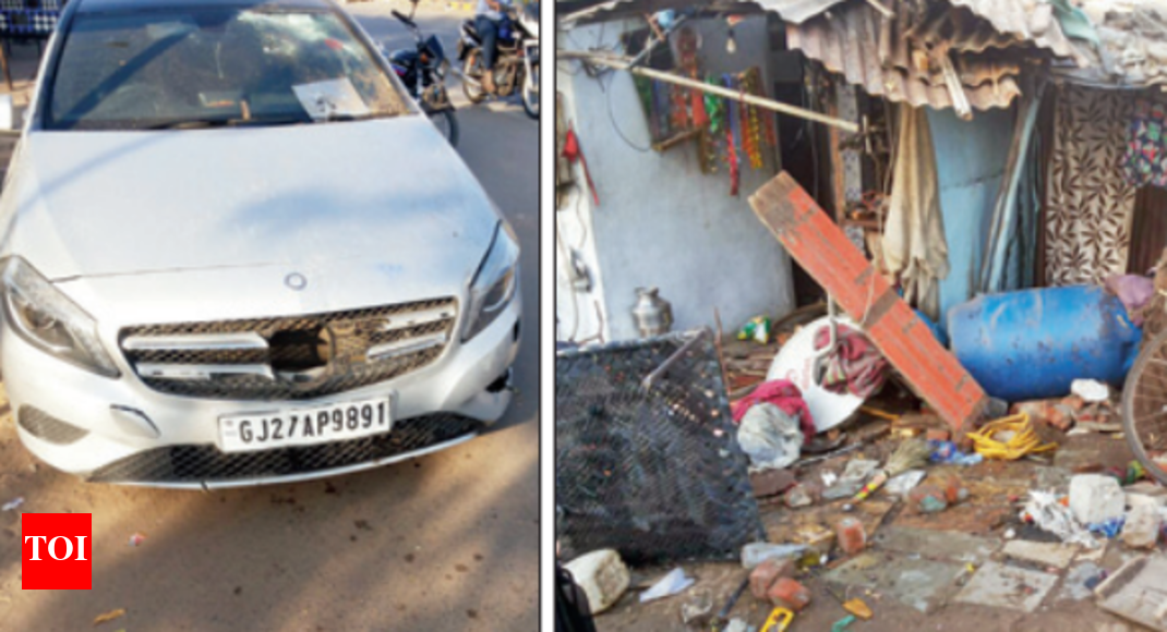 luxury car crash CASE Luxury car crashes into shanties, two injured