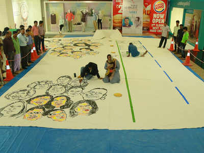 Aiming for a world record, by depicting 60 iconic women on a 12-metre-long shirt!