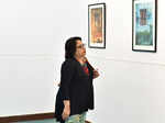 A guest during Vivek Mathew’s solo photography exhibition
