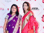 Nykaa.com CEO Falguni Nayar with a guest walks the red carpet