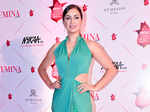 Maryam Zakaria walks the red carpet in a thigh-high split gown