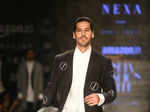Dino Morea walks the ramp for designer Sahil Aneja