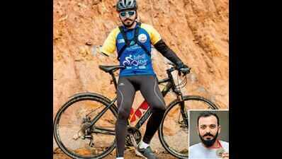 App developer beats disability, pedals to the top